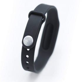 Person walking wearing Brook Pocket Auto Catch and collecting items without looking at phone, safety and convenience