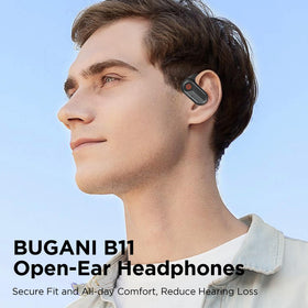 BUGANI earbuds worn by runner demonstrating secure fit and awareness