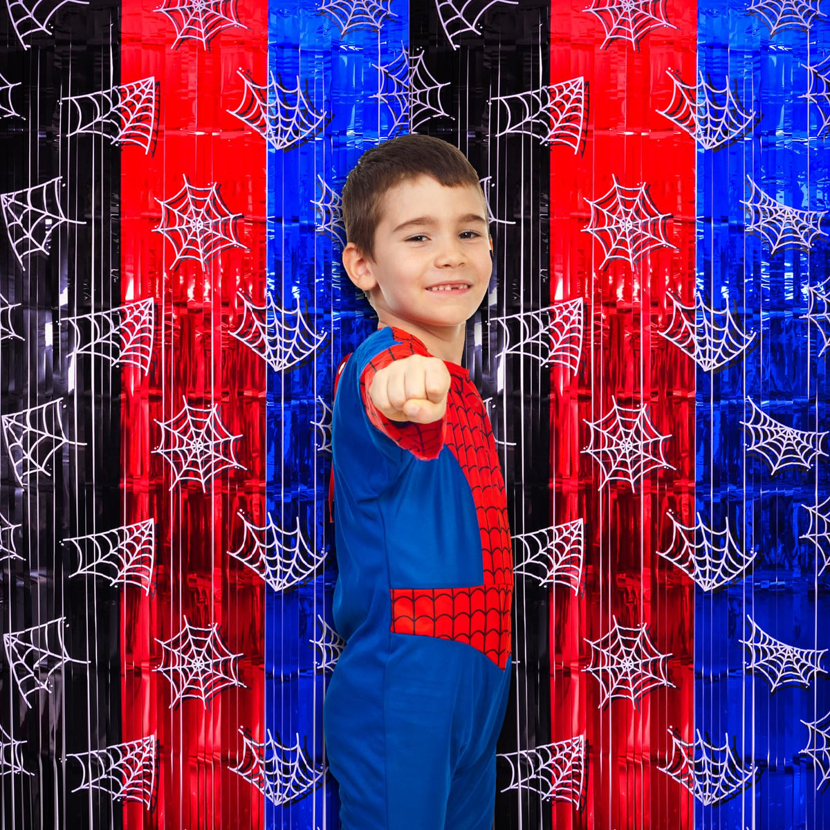 Bupelo spider web curtain doorway backdrop enhances photos.