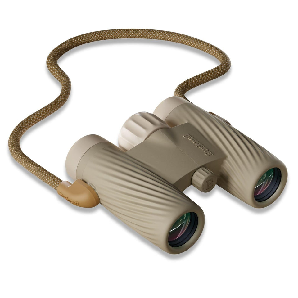 Bushnell A1 10x25 binoculars with Snap-Lock strap for quick, secure carry during outdoor trips.