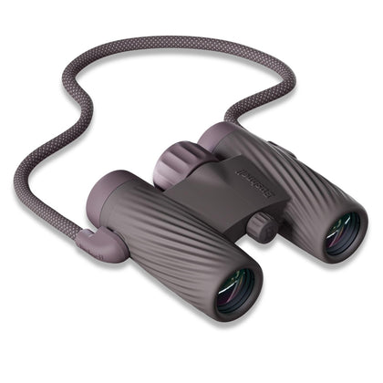 Bushnell A1 8x25 compact binoculars held in hand for easy portability and quick birdwatching.
