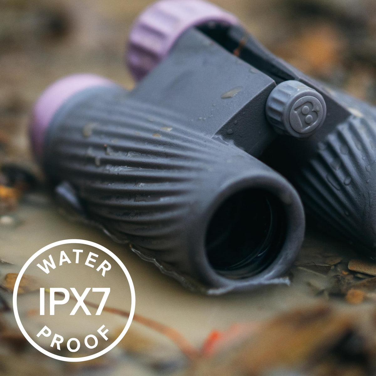 Bushnell A1 8x25 on strap demonstrates SnapLock quick-access carry system.