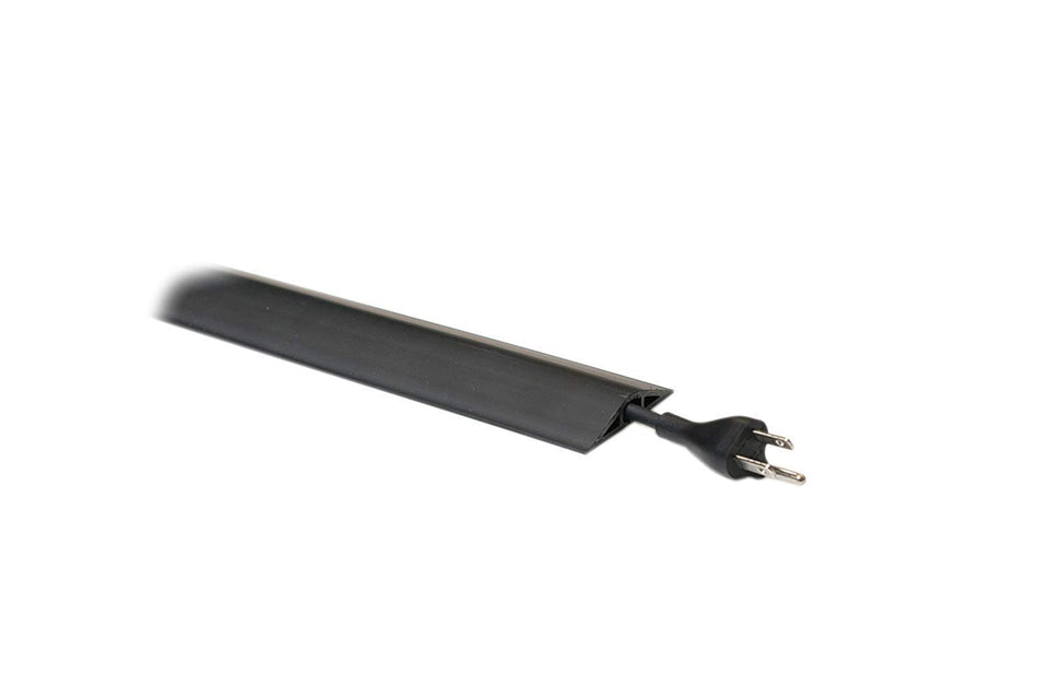 C2G Legrand Wiremold Corduct cord cover on floor concealing a single cable
