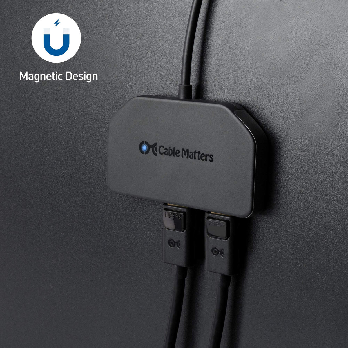 Cable Matters magnetic mount attached to a metal case for secure placement.