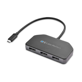 Cable Matters triple-monitor USB-C hub powering three displays in a desk setup.