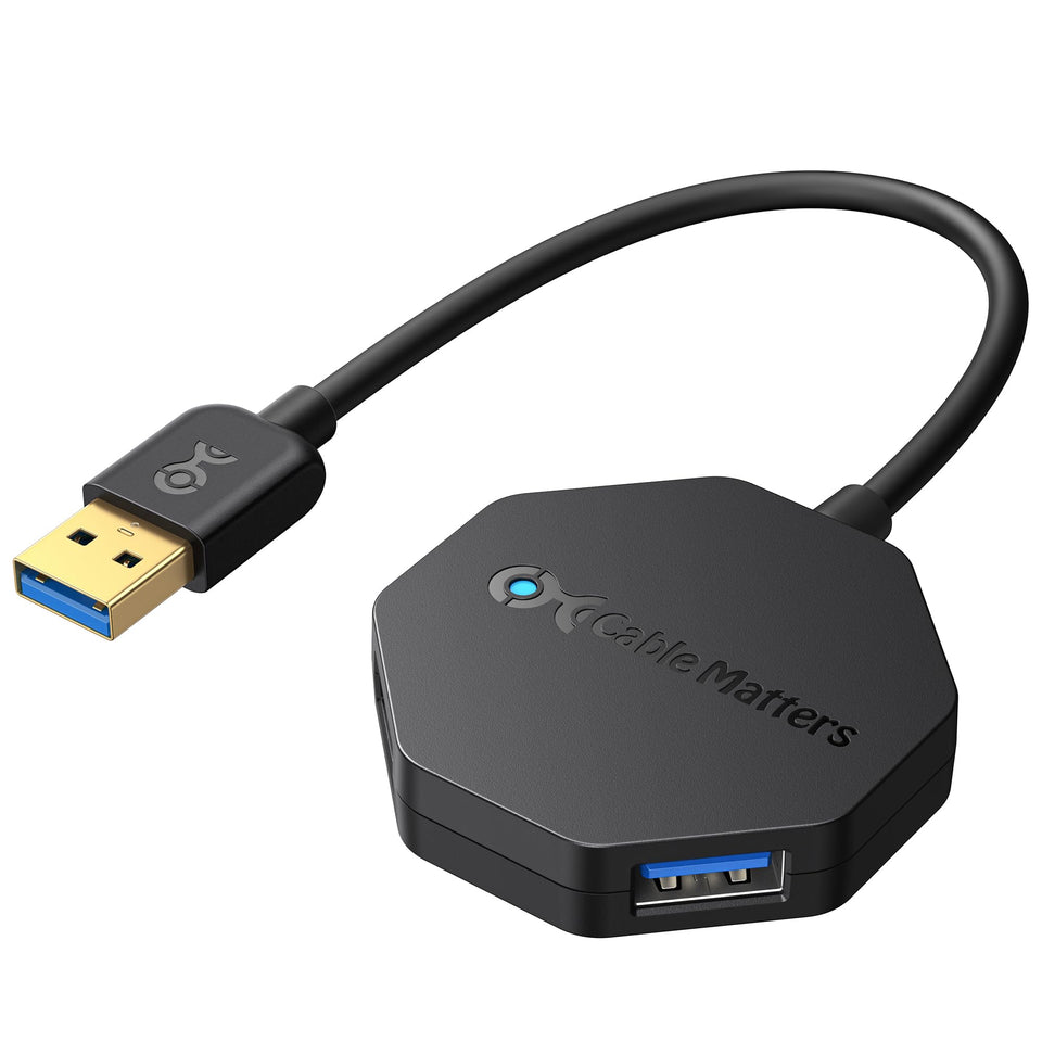 Cable Matters ultra mini hub front view showing four USB ports and compact body, adds convenient connectivity