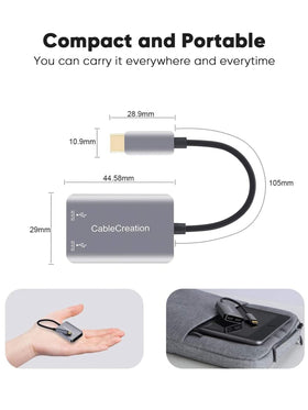 CableCreation dongle used on a commuter bench with phone showing practical lifestyle convenience
