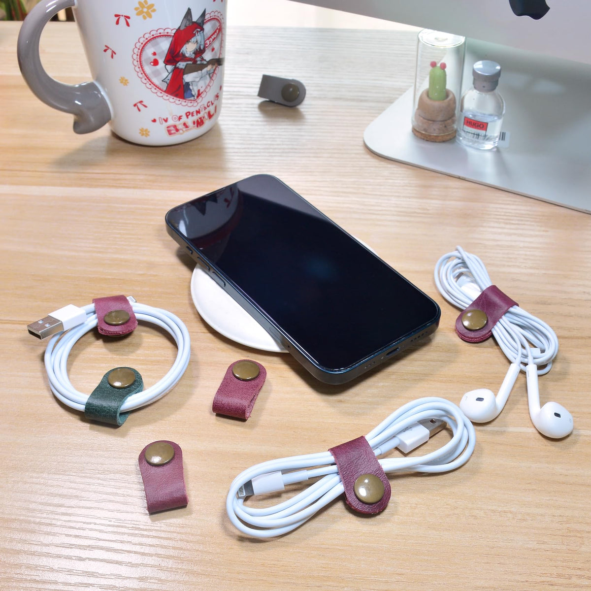 CAILLU leather earbud case protects headphones and travels easily.
