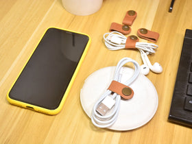 CAILLU USB cable holder keeps cords visible and ready for use.