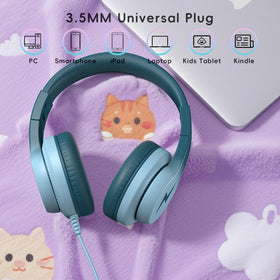 Candy Bila beside tablet for scale showing size and compatibility with kids devices