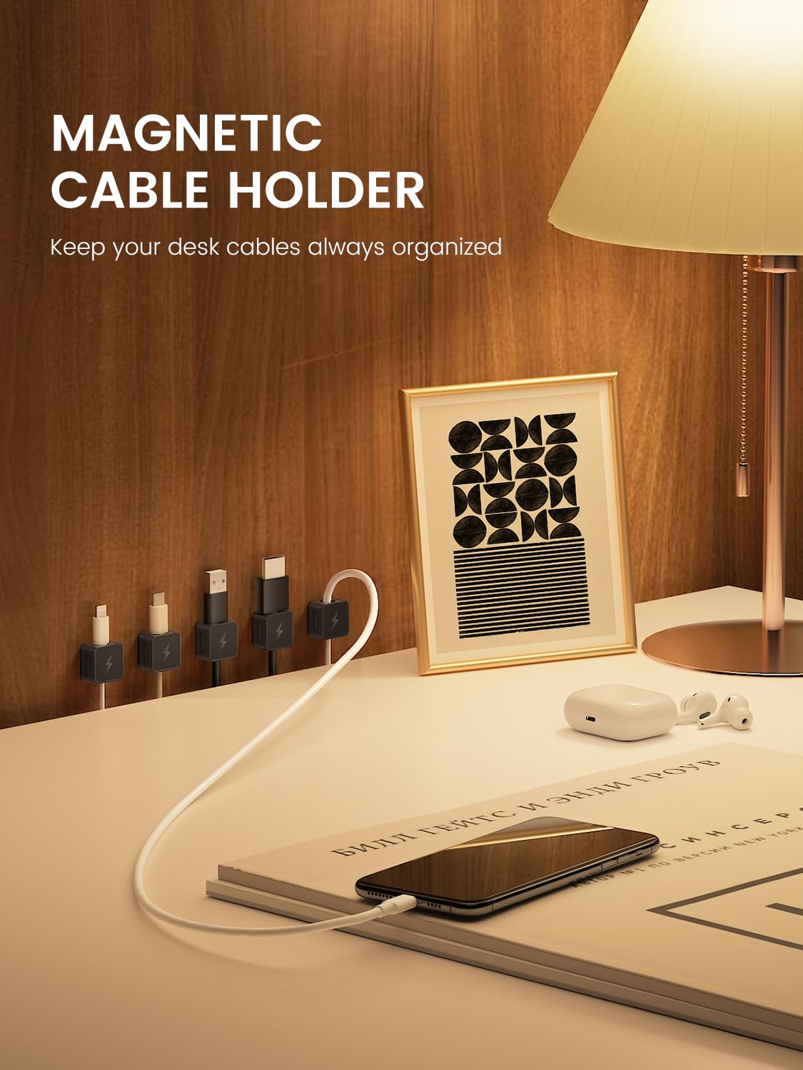 Canisflax clip mounted on nightstand securing phone charging cable tidy