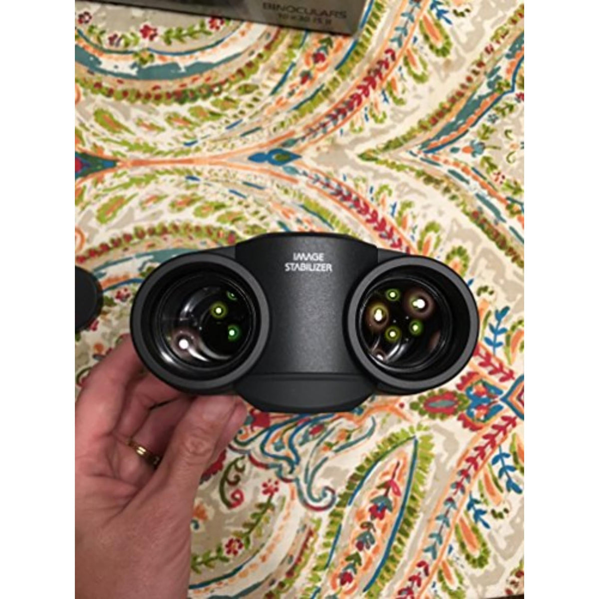 Canon 10x30 IS II binoculars offer bright, edge-to-edge views for cityscapes and concerts.