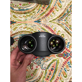 Canon 10x30 IS II binoculars offer bright, edge-to-edge views for cityscapes and concerts.