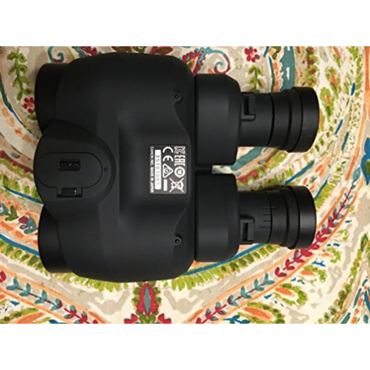 Canon 10x30 IS II binoculars are compact and travel-friendly for adventures.