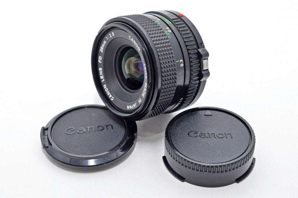 Canon 28mm f/2.8 FD lens front view with breech-lock for sharp wide perspectives