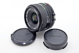 Canon 28mm f/2.8 FD lens front view with breech-lock for sharp wide perspectives
