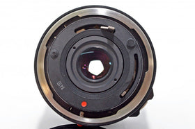 Canon 28mm f/2.8 FD lens with front and rear caps included