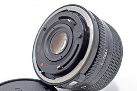 Canon SLR body paired with the 28mm f/2.8 FD lens for versatile wide shots