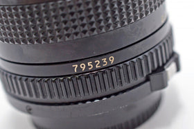 Renewed Canon 28mm f/2.8 FD lens condition label indicating restoration
