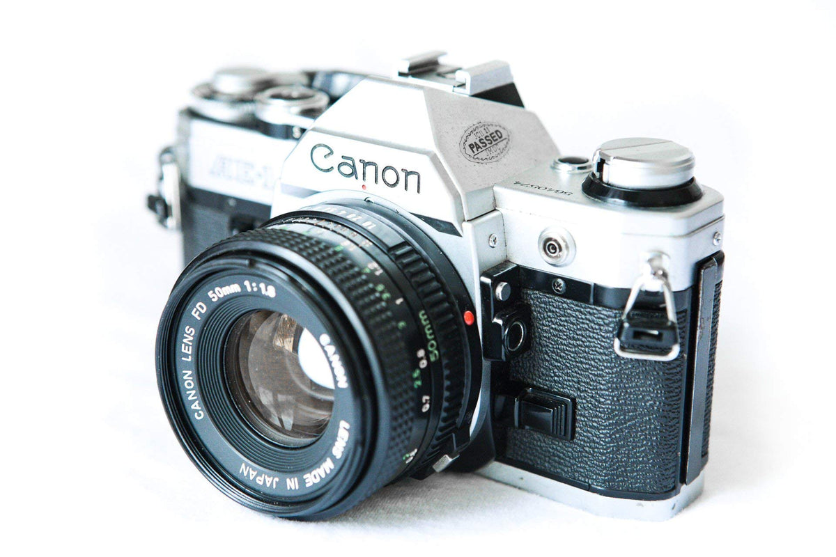 Canon AE-1 back panel and controls for flexible exposure adjustments.
