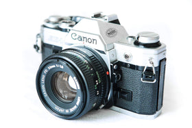 Canon AE-1 back panel and controls for flexible exposure adjustments.