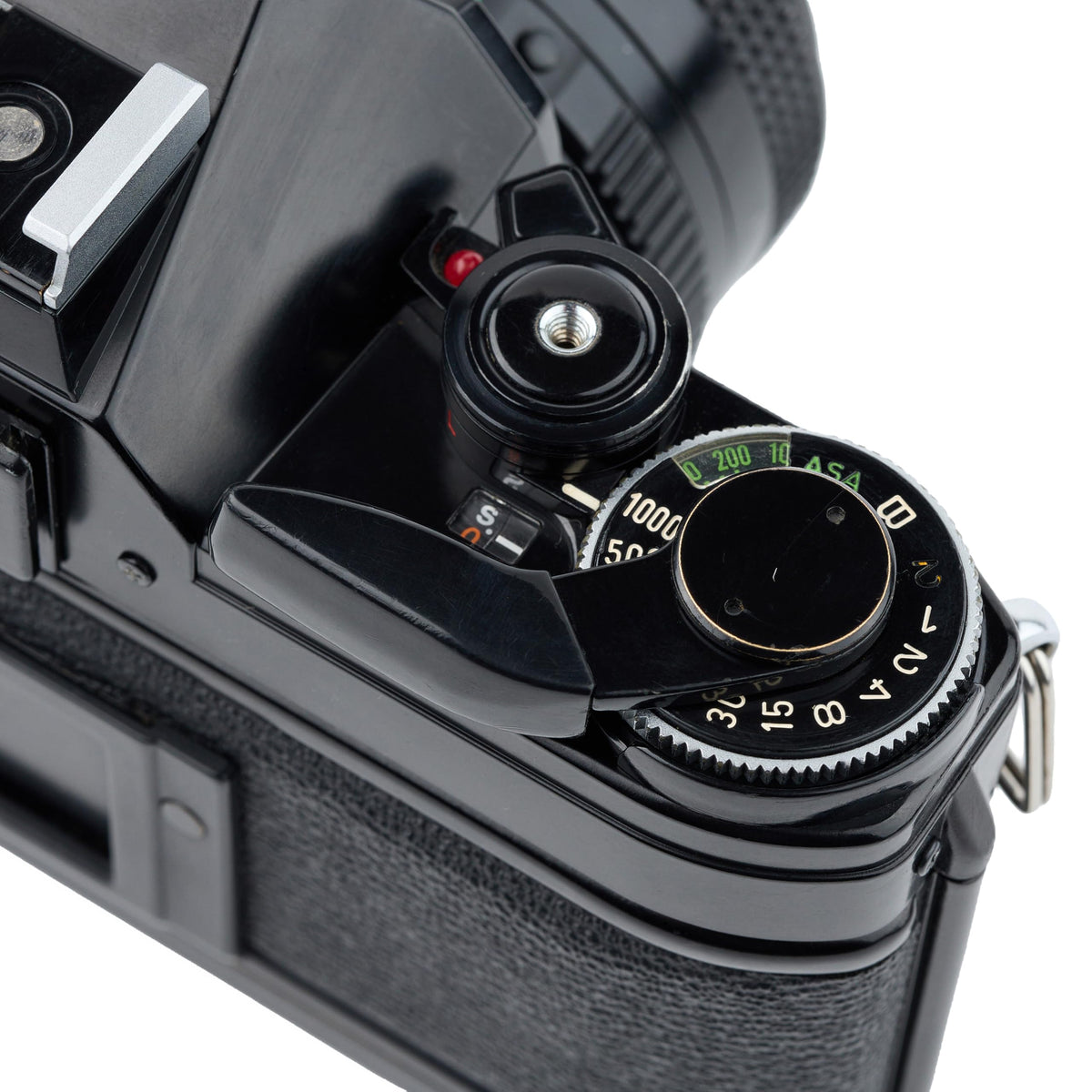 Canon AE-1 interchangeable lenses—expand creative options with different focal lengths.