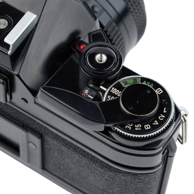 Canon AE-1 interchangeable lenses—expand creative options with different focal lengths.