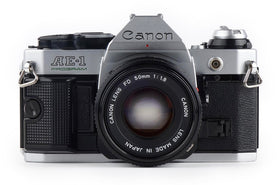 Canon AE-1 Program front view showcases compact retro design for easy daily shooting.