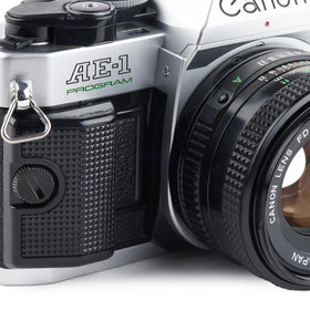 Canon AE-1 Program renewed kit suggests reliable restored performance.