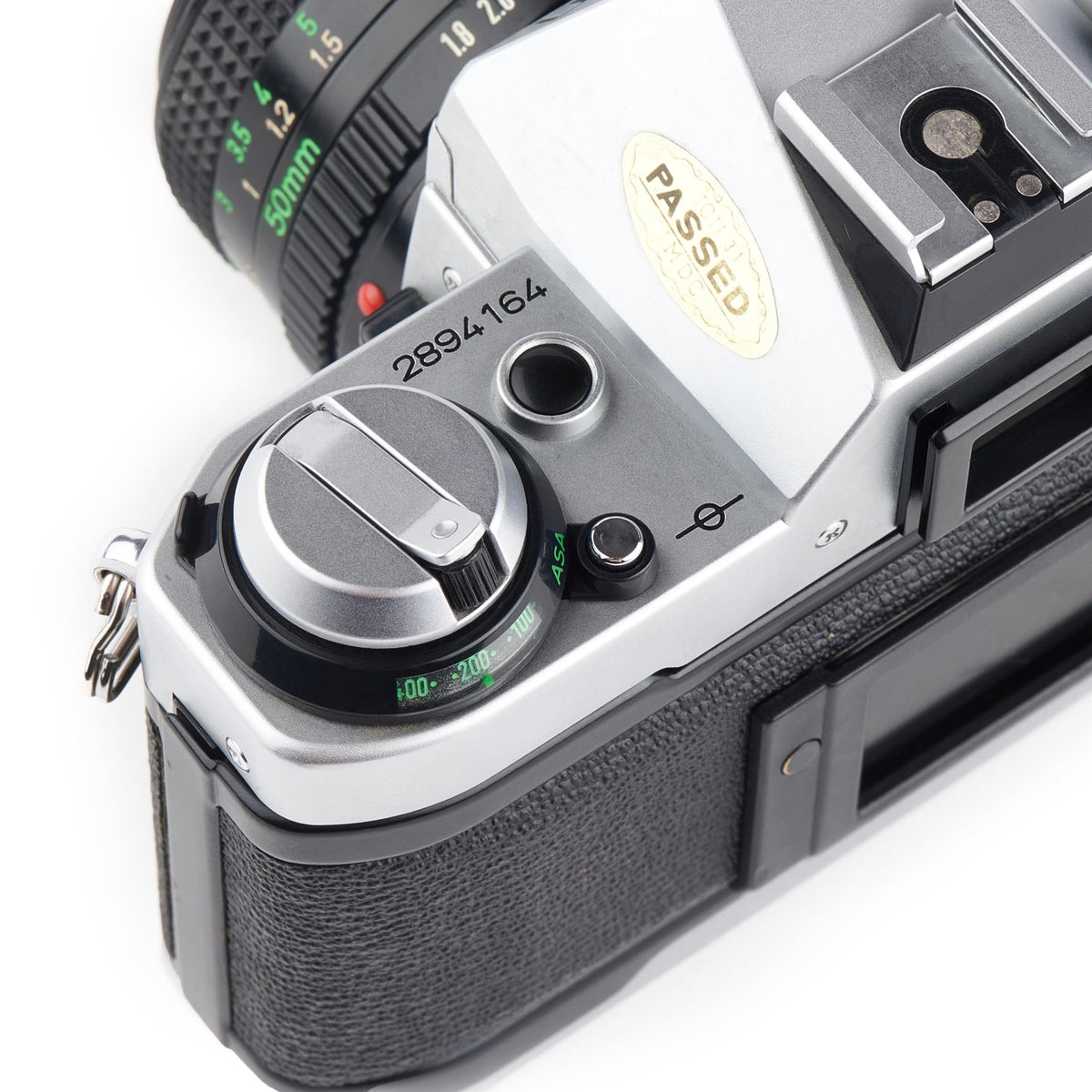 Canon AE-1 Program viewfinder close-up with bright focusing aids.