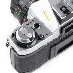 Canon AE-1 Program viewfinder close-up with bright focusing aids.