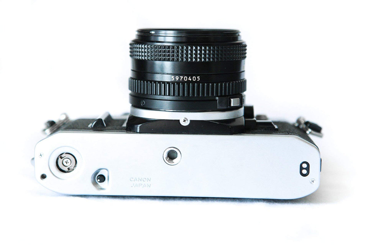 Canon AE-1 renewed condition badge signaling renewed quality and value.