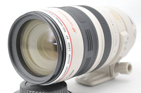 Canon EF 100-400mm lens, zoom ring close-up, smooth adjustment for precise framing.