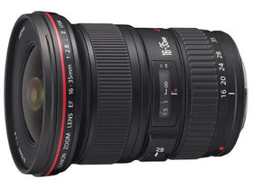 Canon EF 16-35mm zoom lens side profile showing wide perspective potential.