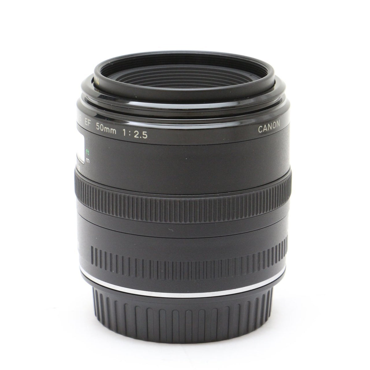 Canon EF 50mm f/2.5 Macro Lens in manual focus view for precise control.