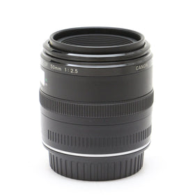 Canon EF 50mm f/2.5 Macro Lens in manual focus view for precise control.