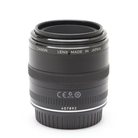 Compact Canon EF 50mm f/2.5 Macro Lens ready for travel and daily use.