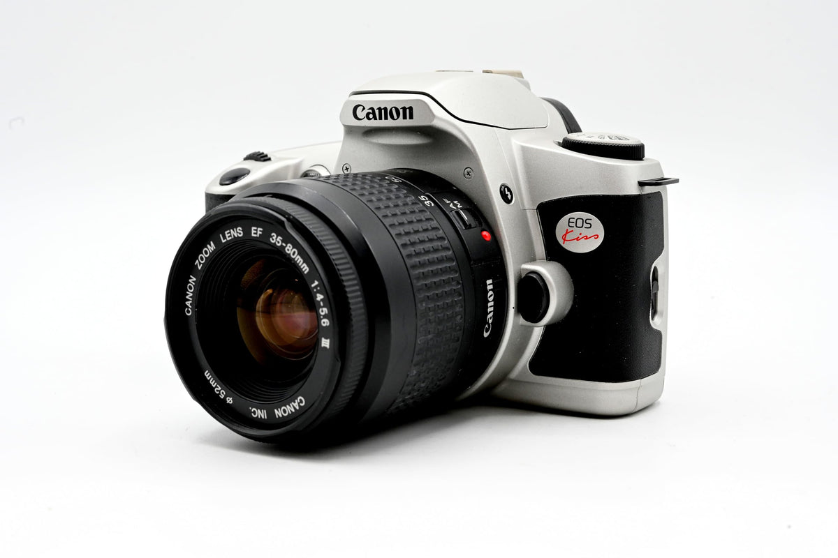Canon EOS Kiss shooting modes dial offering creative options.