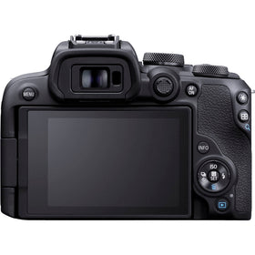 Canon EOS R10 compact design held by a photographer during a shoot