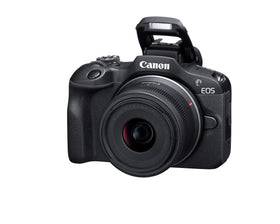 Canon EOS R100 with 55-210mm telephoto zoom for versatile reach