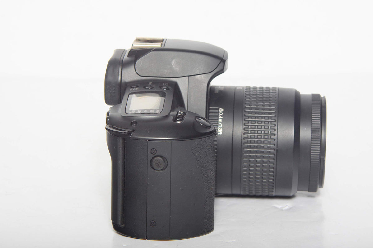 Canon EOS Rebel G battery compartment – reliable power during sessions.