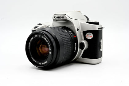 Canon New EOS Kiss front view, compact camera design for travel photography.