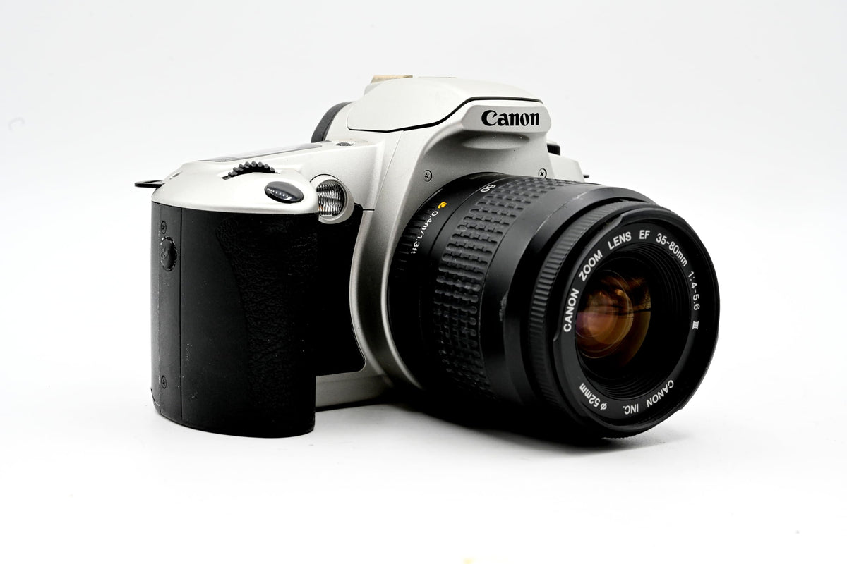 Canon New EOS Kiss side angle, ergonomic grip for comfortable shooting.