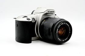 Canon New EOS Kiss side angle, ergonomic grip for comfortable shooting.