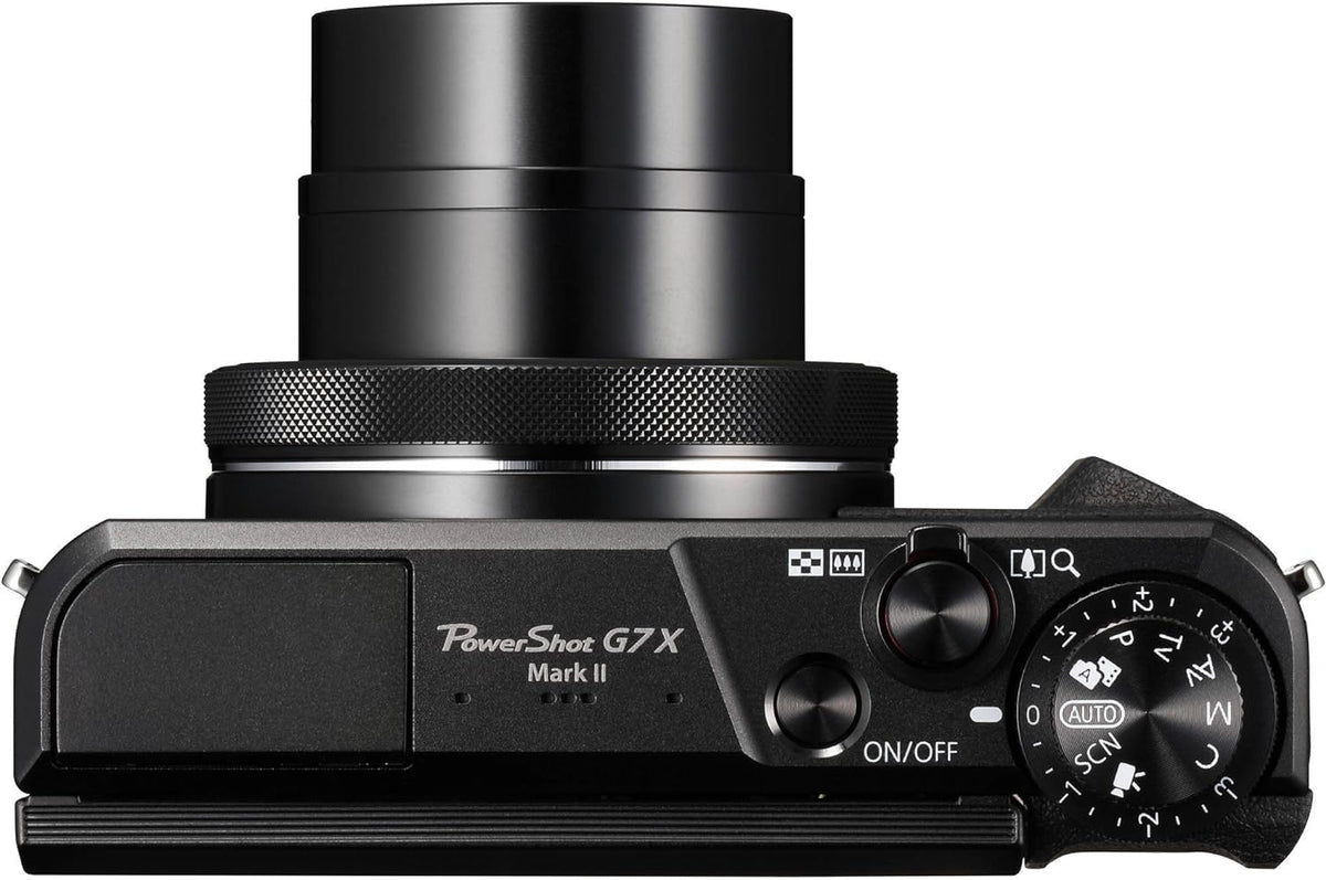 Canon PowerShot G7 X Mark II renewed wrist strap enables secure carry.