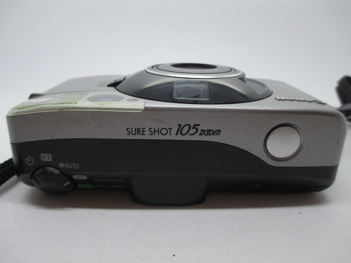 Canon Sure Shot 105 built-in flash helps capture moments in low light.