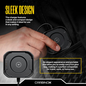 Carbinox USB charger in use beside smartwatch on a desk