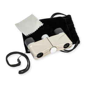 Carson OperaView 4x10mm binocular compact size in hand for theatre viewing.