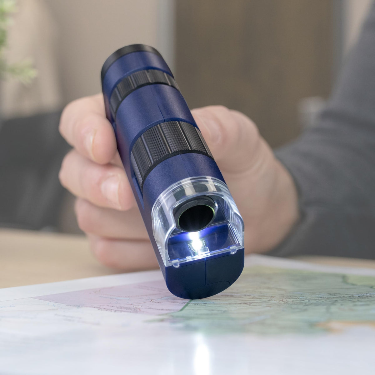 Carson Pocket Micro with built-in LED light for clear observation in dim environments.