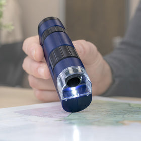 Carson Pocket Micro with built-in LED light for clear observation in dim environments.